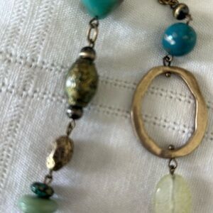 Beautiful green and gold tone necklace, double strand by Premier Designs.